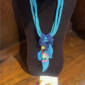 Blue Beaded Necklace with Feather Pendant